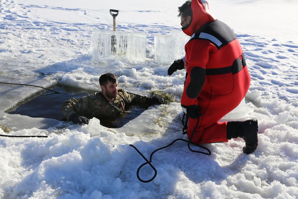 Cold-Weather Operations Course students battle icy conditions in cold-water immersion training at Fort McCoy