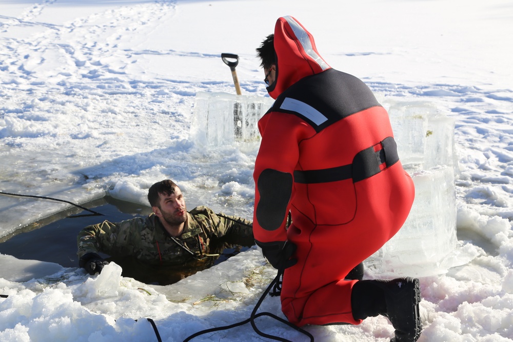 Cold-Weather Operations Course students battle icy conditions in cold-water immersion training at Fort McCoy