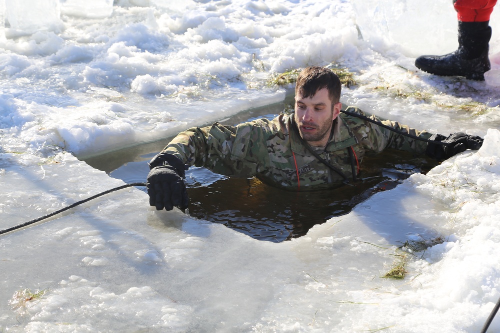 Cold-Weather Operations Course students battle icy conditions in cold-water immersion training at Fort McCoy