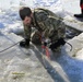 Cold-Weather Operations Course students battle icy conditions in cold-water immersion training at Fort McCoy