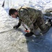 Cold-Weather Operations Course students battle icy conditions in cold-water immersion training at Fort McCoy