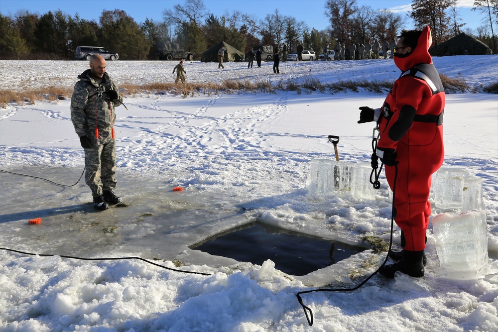 Cold-Weather Operations Course students battle icy conditions in cold-water immersion training at Fort McCoy