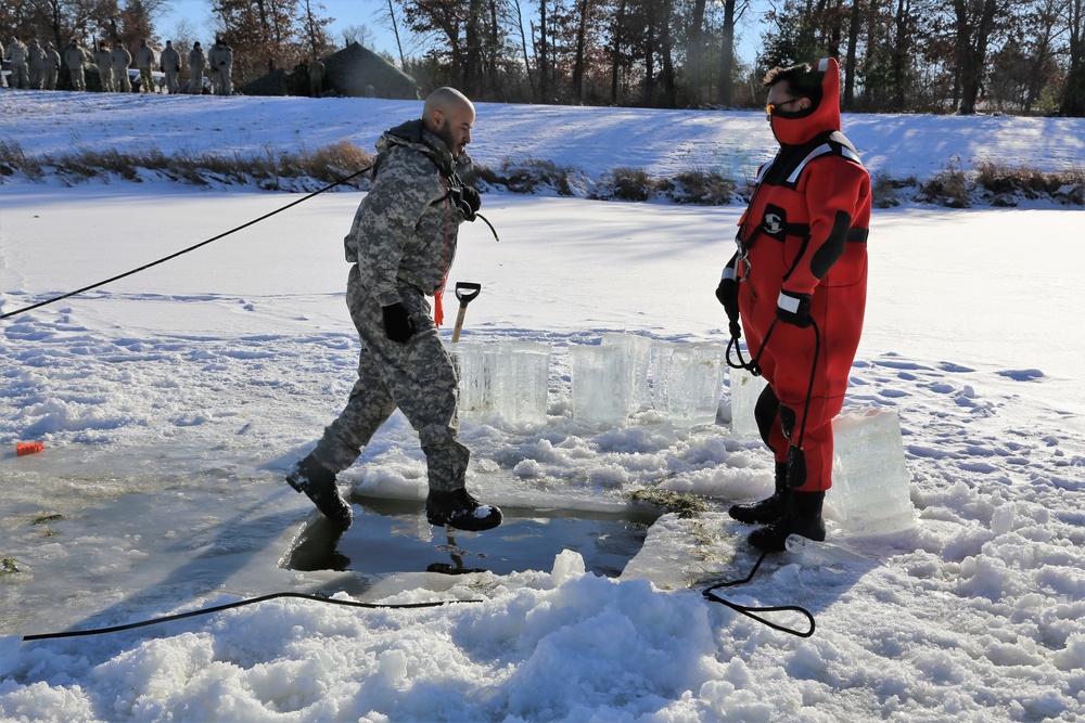 Cold-Weather Operations Course students battle icy conditions in cold-water immersion training at Fort McCoy