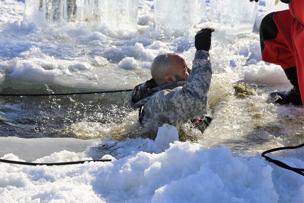 Cold-Weather Operations Course students battle icy conditions in cold-water immersion training at Fort McCoy