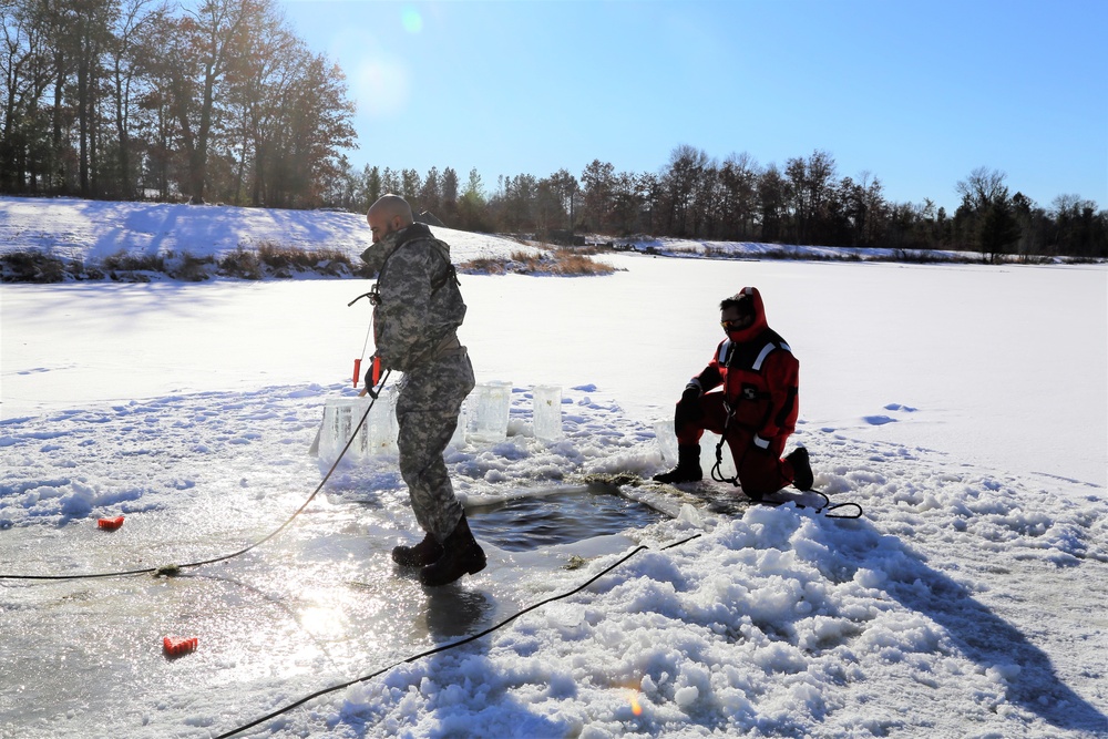 Cold-Weather Operations Course students battle icy conditions in cold-water immersion training at Fort McCoy