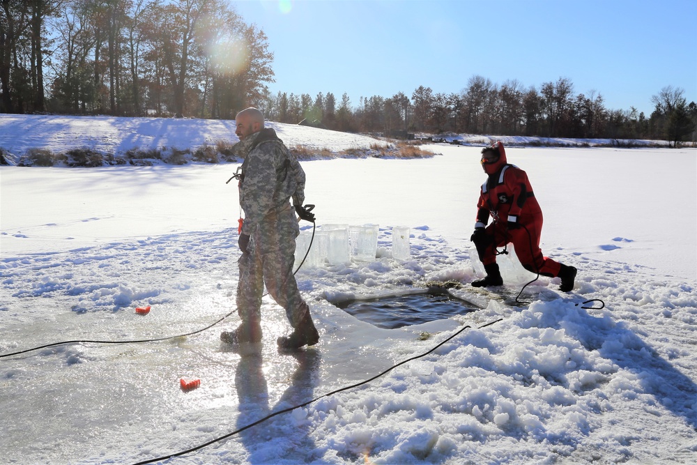 Cold-Weather Operations Course students battle icy conditions in cold-water immersion training at Fort McCoy