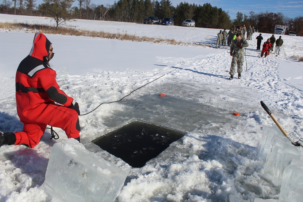 Students take plunge in icy water for Cold-Weather Operations Course 18-02 at Fort McCoy