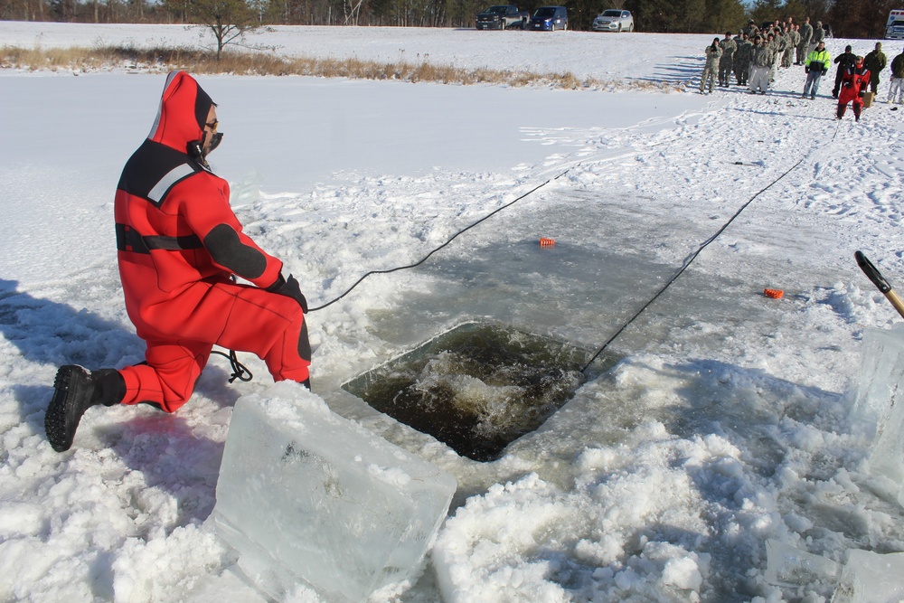 Students take plunge in icy water for Cold-Weather Operations Course 18-02 at Fort McCoy