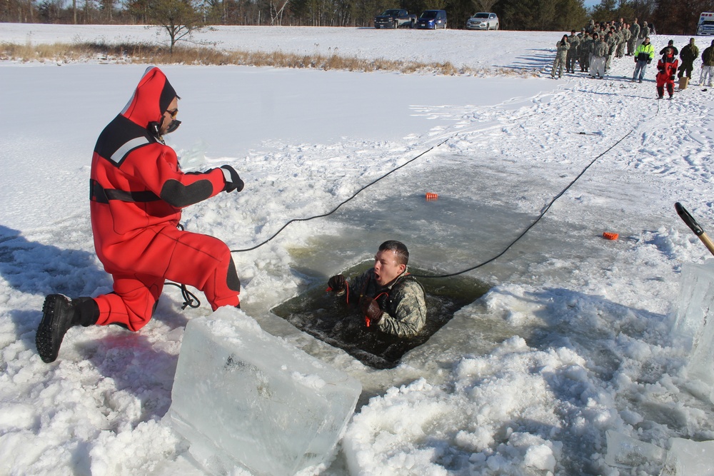 Students take plunge in icy water for Cold-Weather Operations Course 18-02 at Fort McCoy