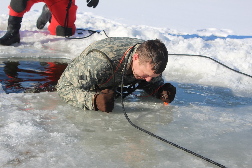 Students take plunge in icy water for Cold-Weather Operations Course 18-02 at Fort McCoy