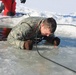 Students take plunge in icy water for Cold-Weather Operations Course 18-02 at Fort McCoy