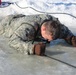 Students take plunge in icy water for Cold-Weather Operations Course 18-02 at Fort McCoy