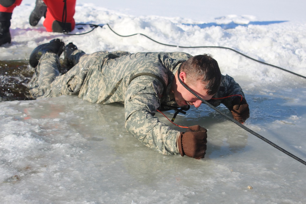 Students take plunge in icy water for Cold-Weather Operations Course 18-02 at Fort McCoy