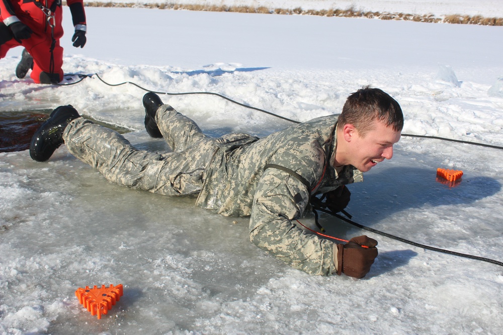 Students take plunge in icy water for Cold-Weather Operations Course 18-02 at Fort McCoy