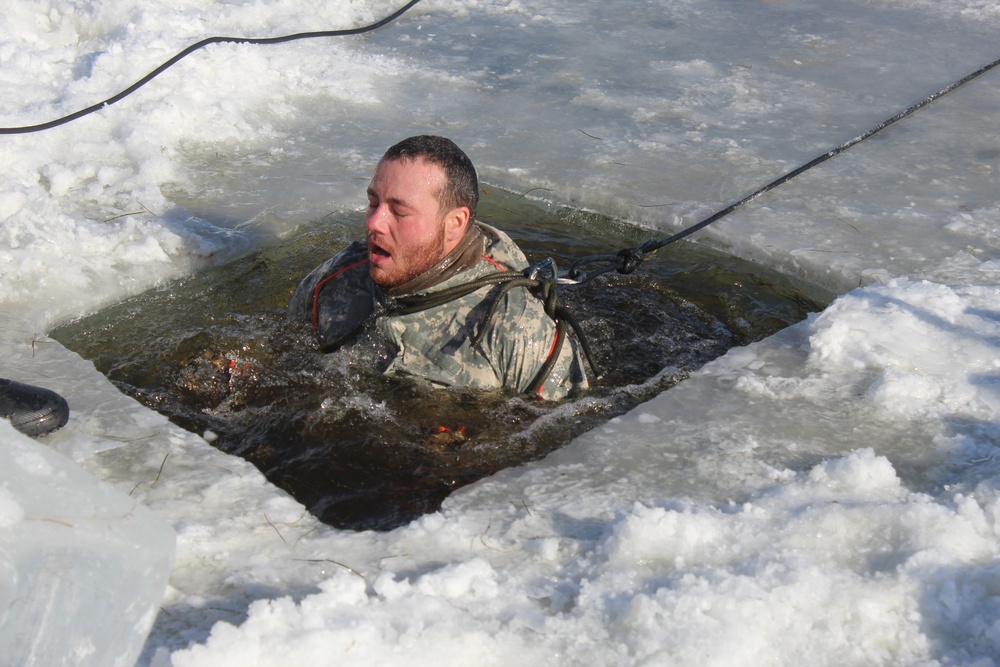 Students take plunge in icy water for Cold-Weather Operations Course 18-02 at Fort McCoy