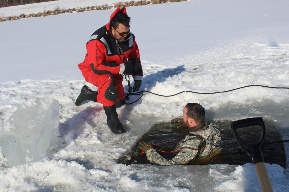 Students take plunge in icy water for Cold-Weather Operations Course 18-02 at Fort McCoy