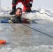 Students take plunge in icy water for Cold-Weather Operations Course 18-02 at Fort McCoy