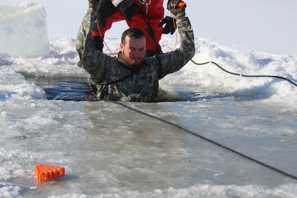 Students take plunge in icy water for Cold-Weather Operations Course 18-02 at Fort McCoy