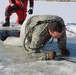 Students take plunge in icy water for Cold-Weather Operations Course 18-02 at Fort McCoy