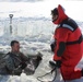 Students take plunge in icy water for Cold-Weather Operations Course 18-02 at Fort McCoy