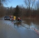 Coast Guard members help evacuate