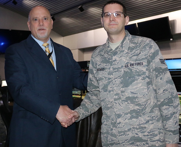 Musumeci Coined by Visiting Deputy Assistant Air Force Secretary