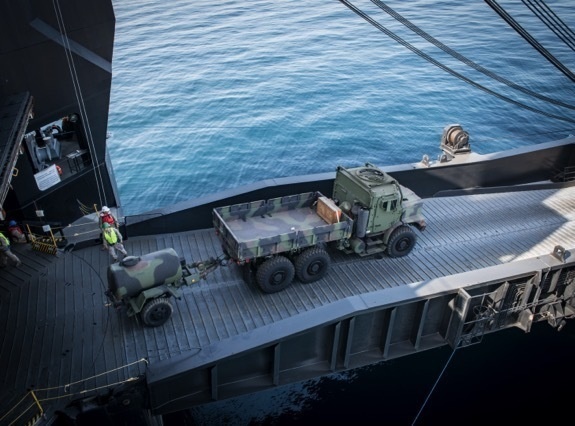 Military moves equipment from ship-to-shore using causeway ferry