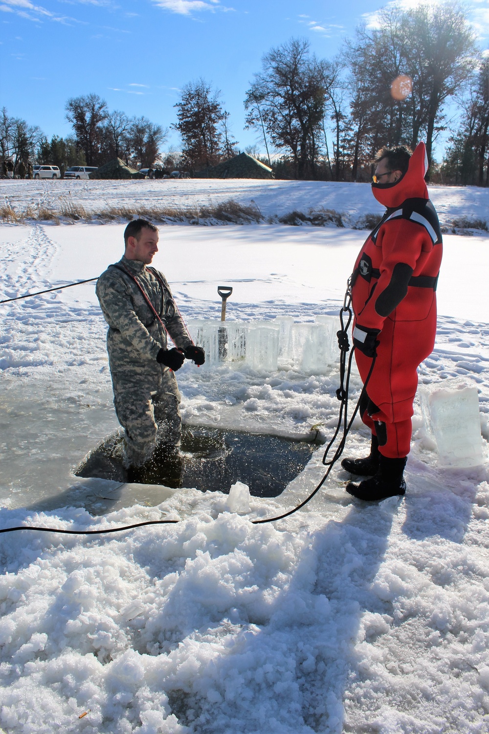 Students take plunge in icy water for Cold-Weather Operations Course 18-02 at Fort McCoy