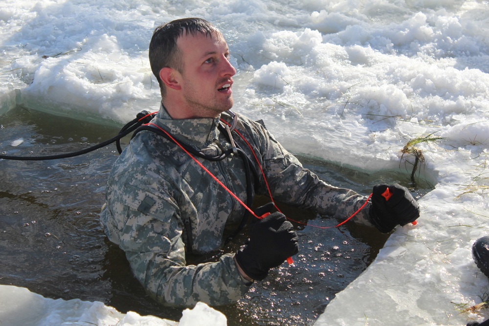 Students take plunge in icy water for Cold-Weather Operations Course 18-02 at Fort McCoy