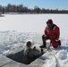 Students take plunge in icy water for Cold-Weather Operations Course 18-02 at Fort McCoy