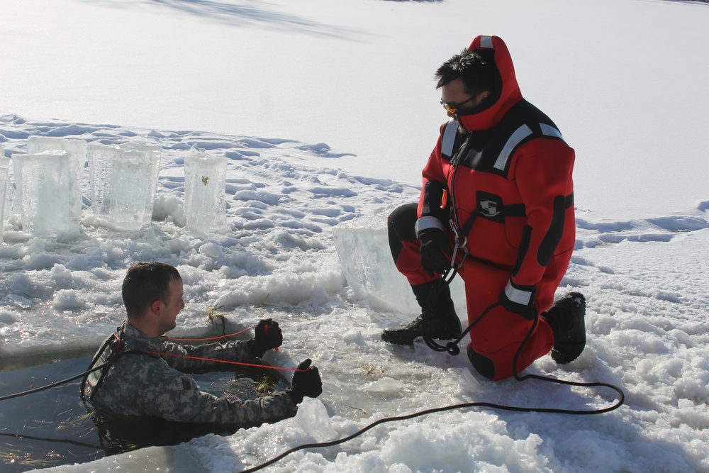 Students take plunge in icy water for Cold-Weather Operations Course 18-02 at Fort McCoy