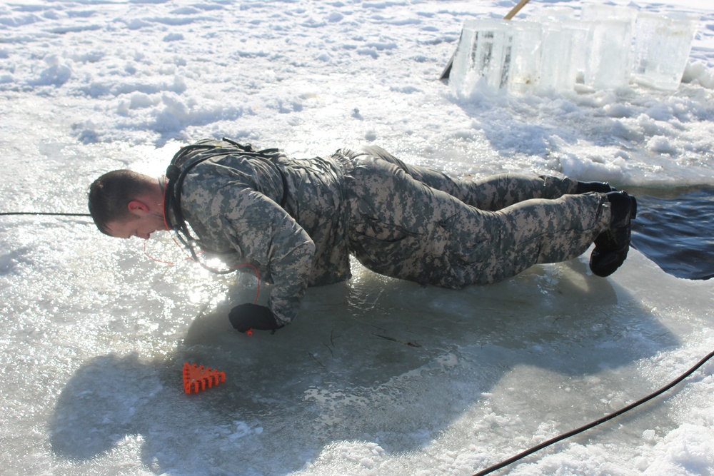 Students take plunge in icy water for Cold-Weather Operations Course 18-02 at Fort McCoy