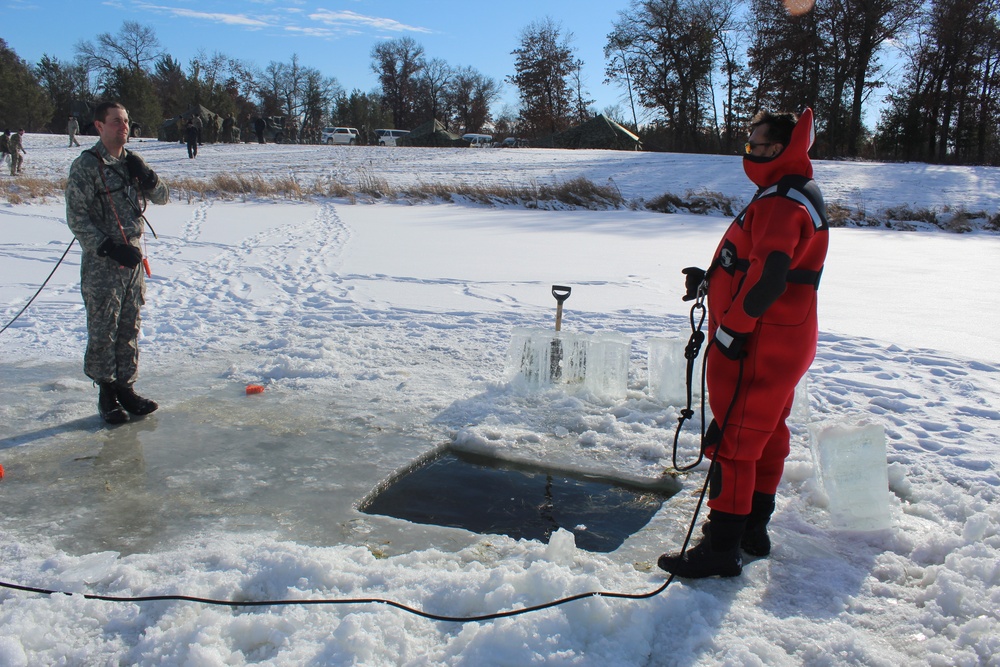 Students take plunge in icy water for Cold-Weather Operations Course 18-02 at Fort McCoy