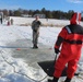 Students take plunge in icy water for Cold-Weather Operations Course 18-02 at Fort McCoy