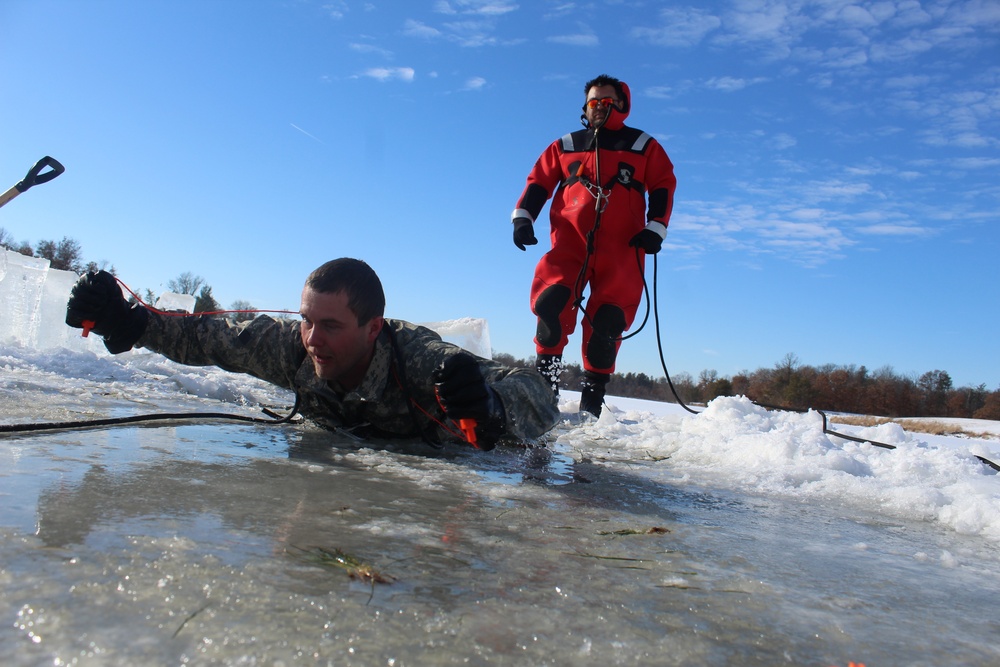 Students take plunge in icy water for Cold-Weather Operations Course 18-02 at Fort McCoy