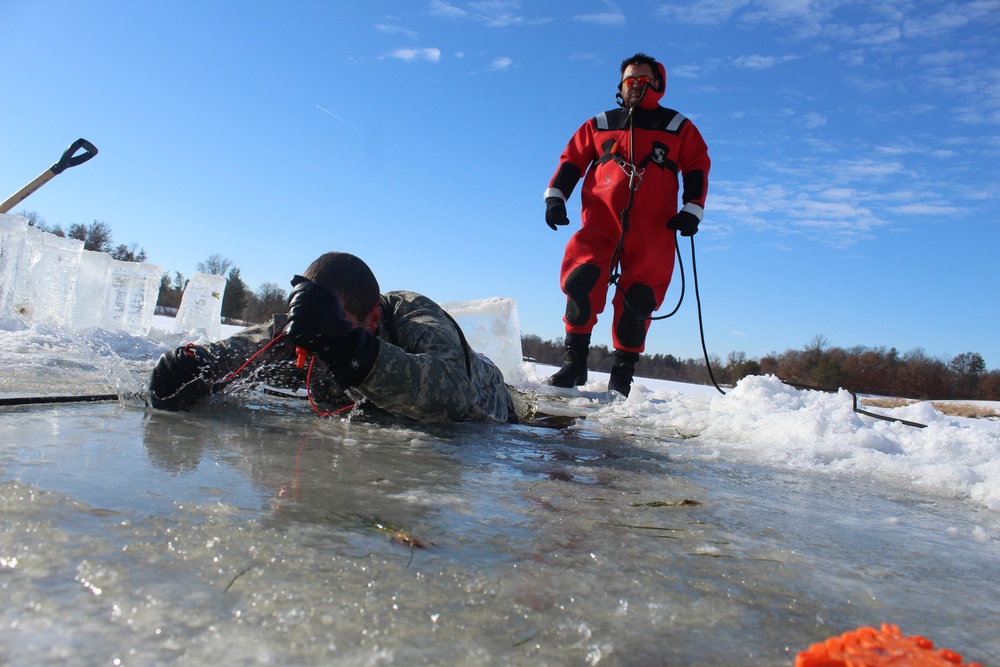 Students take plunge in icy water for Cold-Weather Operations Course 18-02 at Fort McCoy