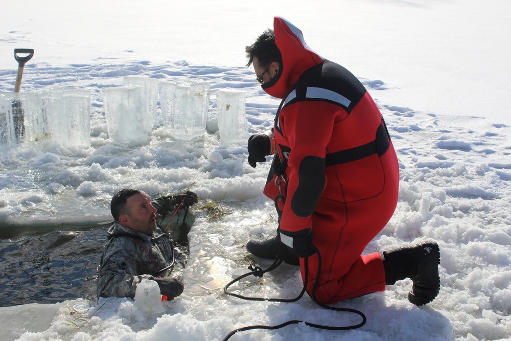 Students take plunge in icy water for Cold-Weather Operations Course 18-02 at Fort McCoy