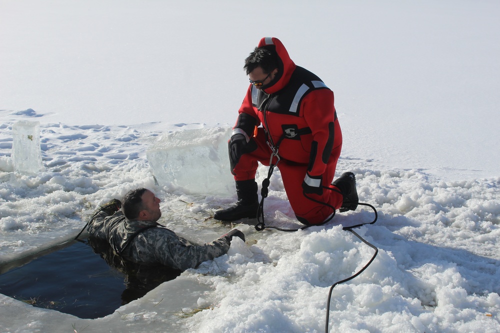 Students take plunge in icy water for Cold-Weather Operations Course 18-02 at Fort McCoy