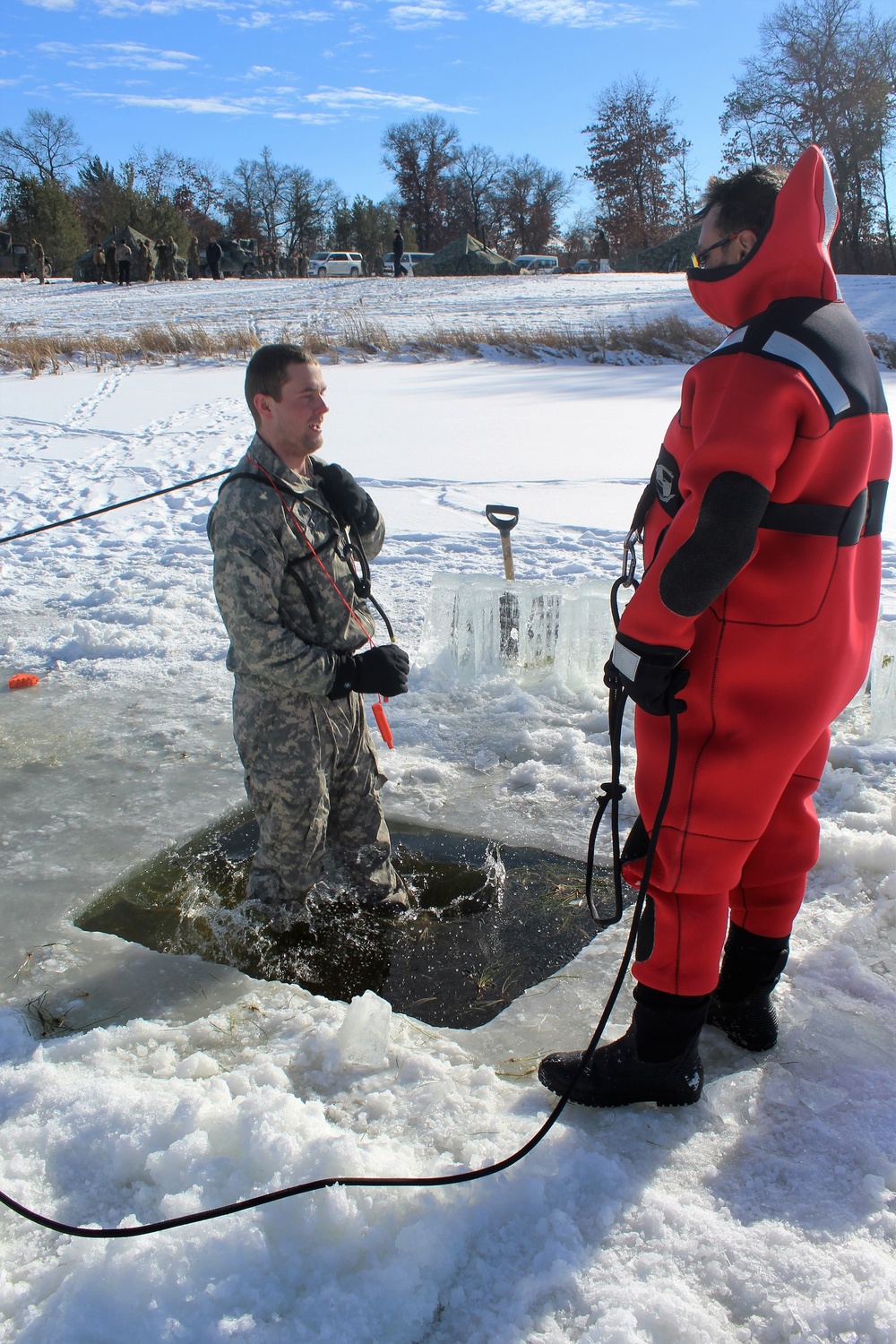 Students take plunge in icy water for Cold-Weather Operations Course 18-02 at Fort McCoy