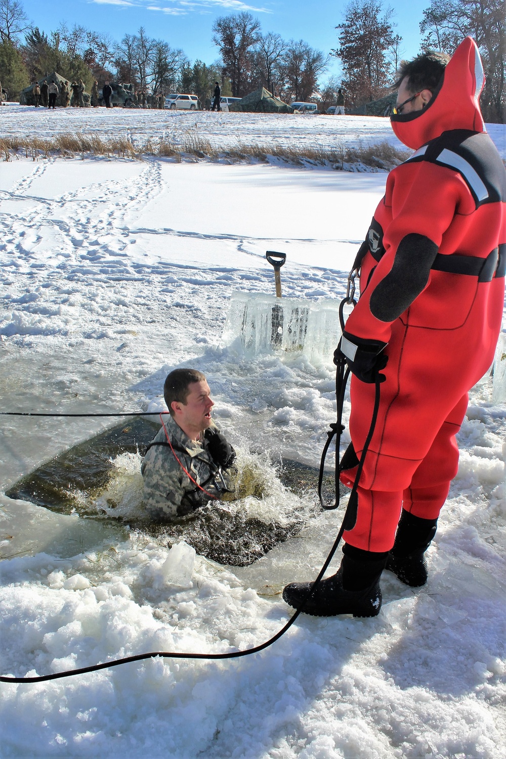 Students take plunge in icy water for Cold-Weather Operations Course 18-02 at Fort McCoy