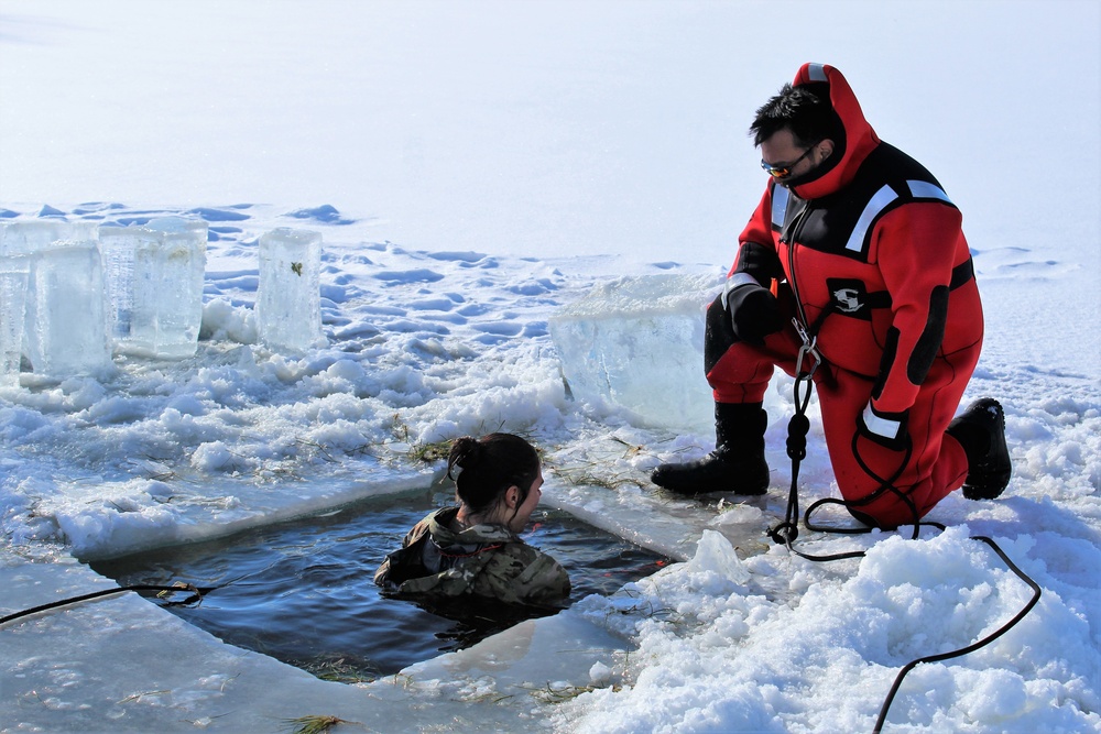 Students take plunge in icy water for Cold-Weather Operations Course 18-02 at Fort McCoy