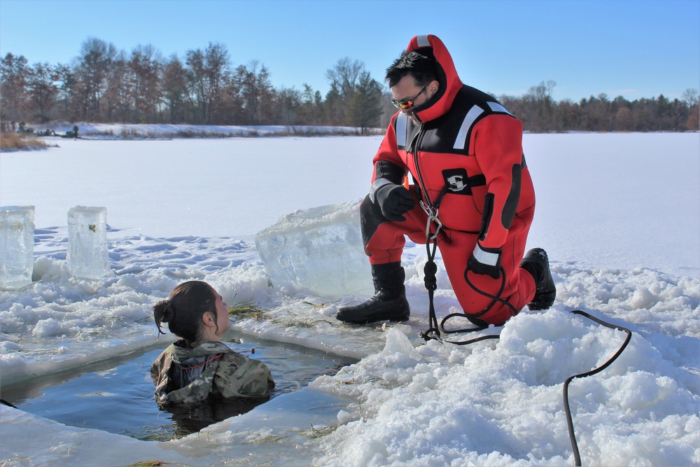 Students take plunge in icy water for Cold-Weather Operations Course 18-02 at Fort McCoy