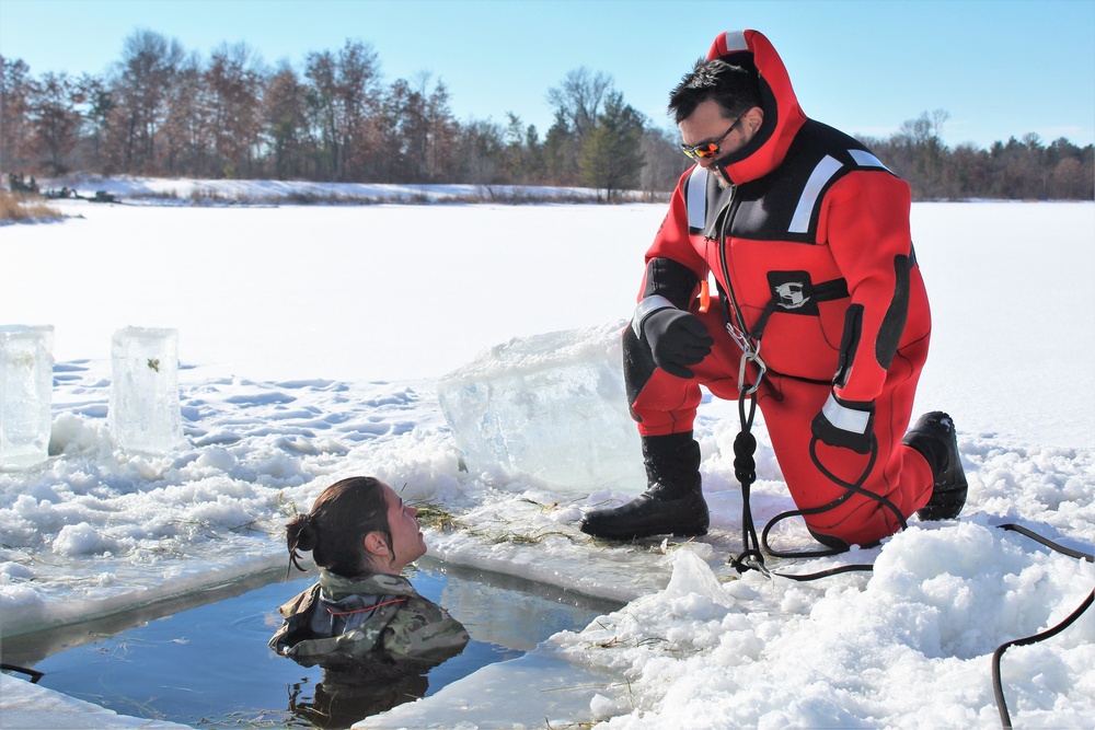 Students take plunge in icy water for Cold-Weather Operations Course 18-02 at Fort McCoy