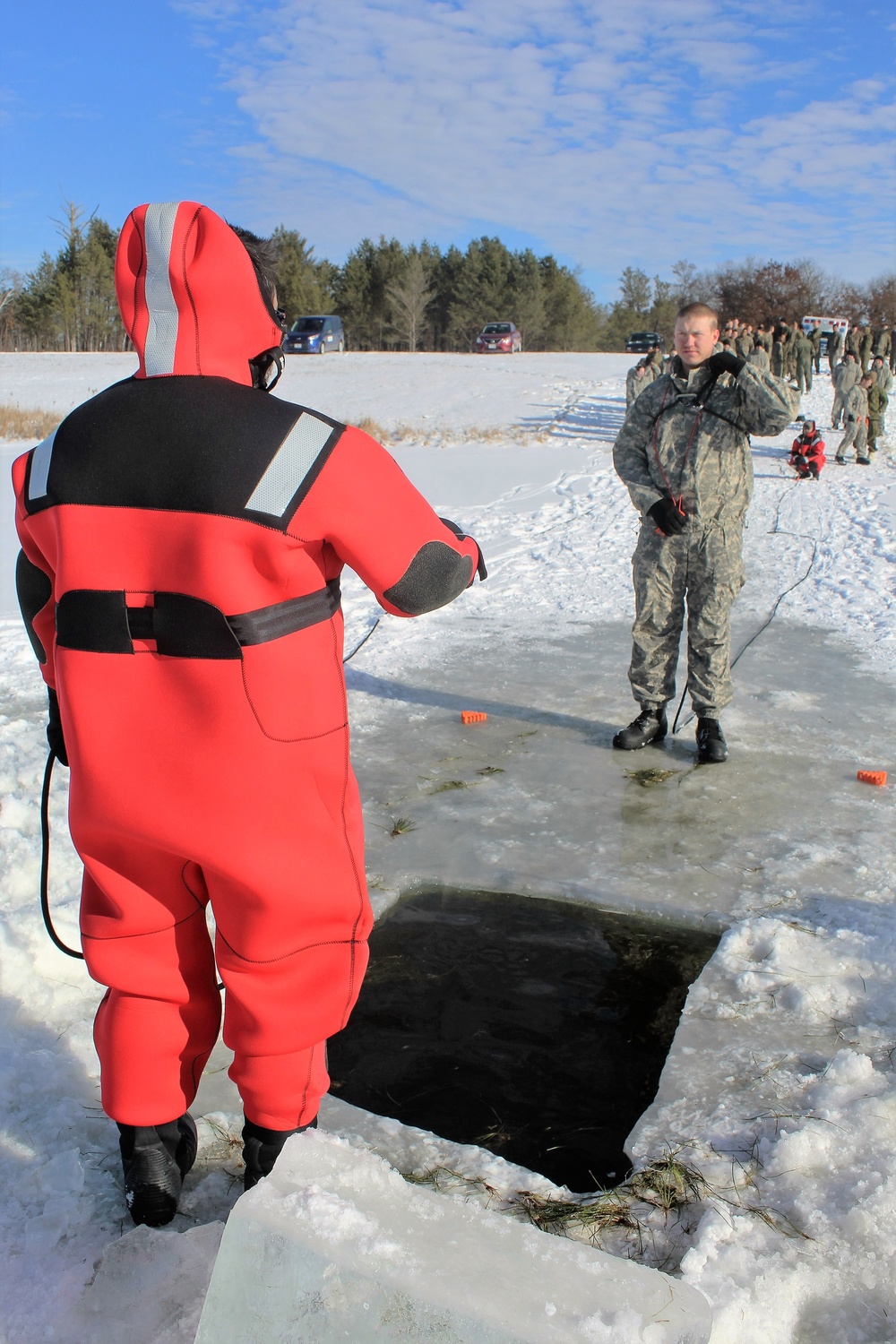 Students take plunge in icy water for Cold-Weather Operations Course 18-02 at Fort McCoy