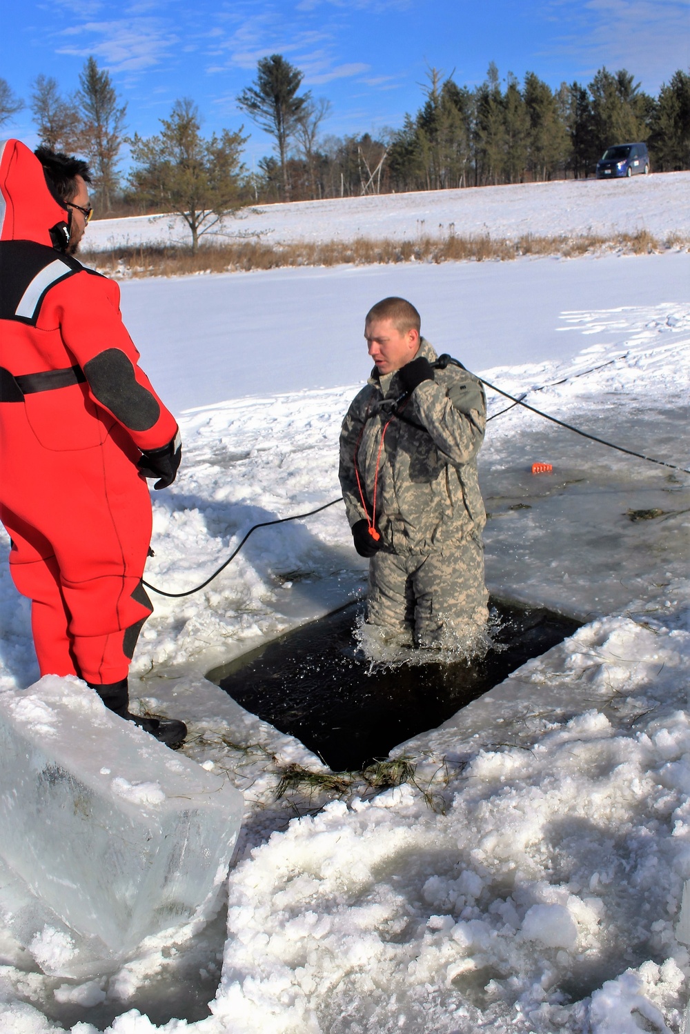 Students take plunge in icy water for Cold-Weather Operations Course 18-02 at Fort McCoy