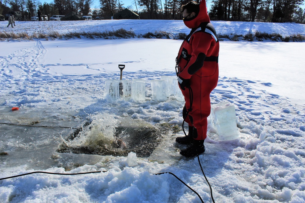 Students take plunge in icy water for Cold-Weather Operations Course 18-02 at Fort McCoy