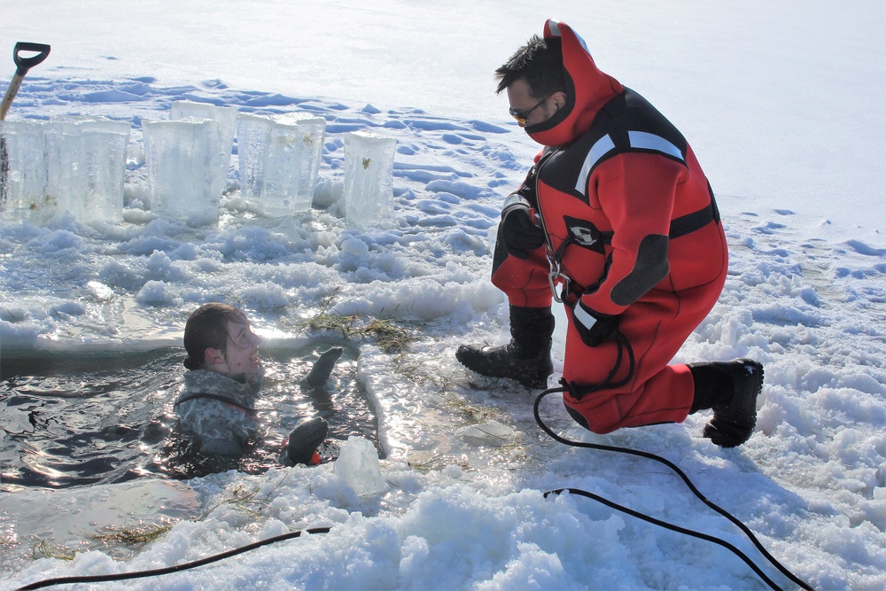 Students take plunge in icy water for Cold-Weather Operations Course 18-02 at Fort McCoy