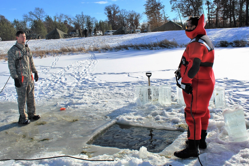 Students take plunge in icy water for Cold-Weather Operations Course 18-02 at Fort McCoy