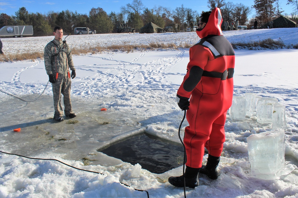 Students take plunge in icy water for Cold-Weather Operations Course 18-02 at Fort McCoy