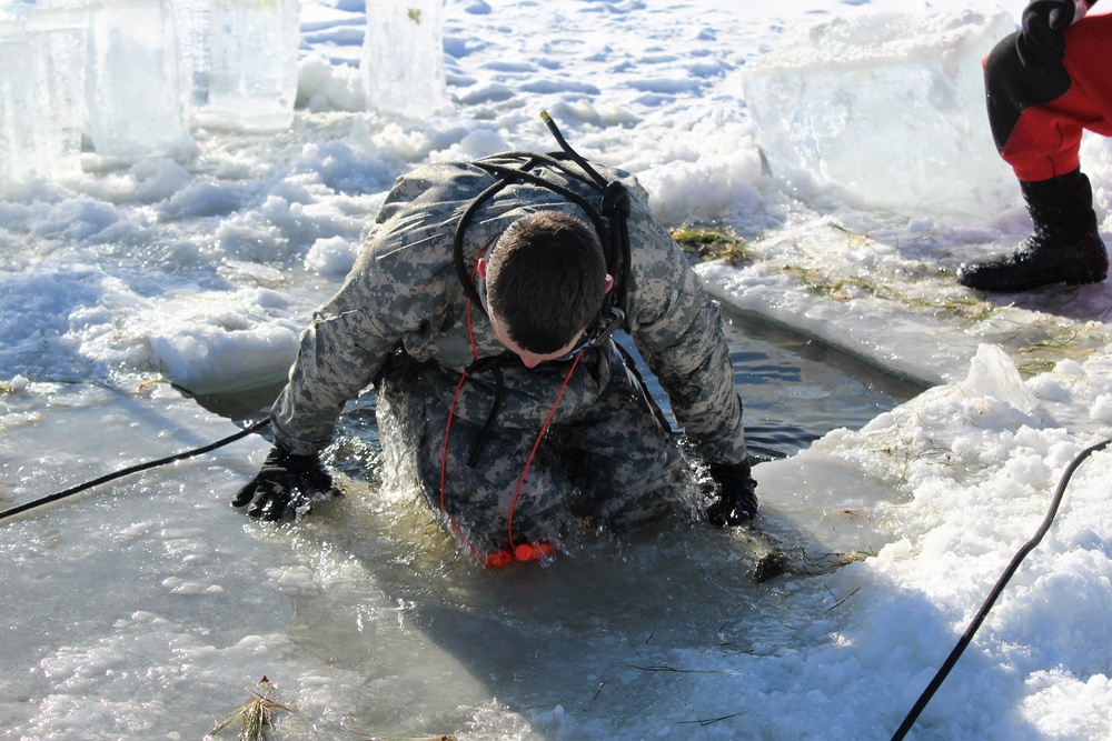 Students take plunge in icy water for Cold-Weather Operations Course 18-02 at Fort McCoy